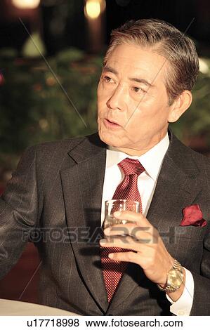Stock Photo - Portrait of Japanese executive. Fotosearch