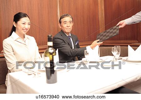 Stock Image - Scene of restaurant. Fotosearch