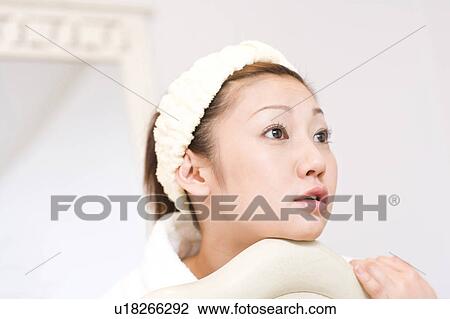 Stock Image - Japanese woman after taking bath. Fotosearch