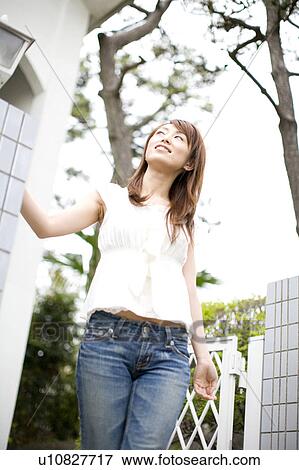 Japanese woman going out from home View Large Photo Image Stock Photo - Japanese woman going out from home. Fotosearch