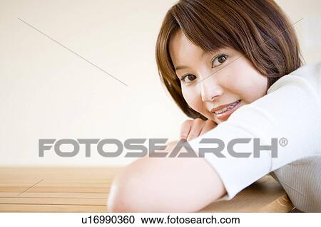Stock Image - Portrait of woman. Fotosearch