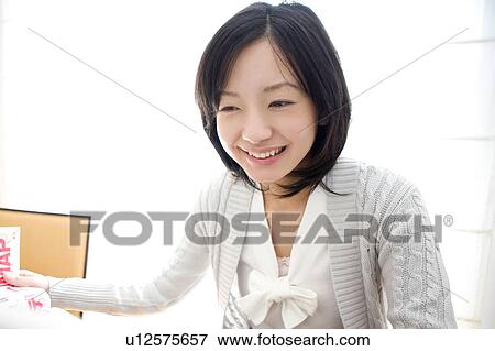 Stock Photo - Portrait of woman. Fotosearch