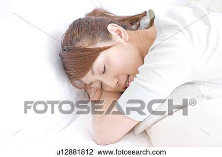 Stock Image - Sleeping face of Japanese woman. Fotosearch