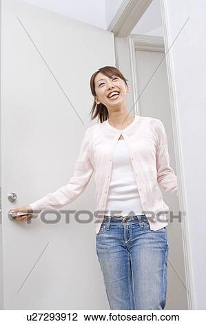 Stock Image - Smiling Japanese woman. Fotosearch