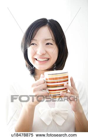 Stock Photography - Smiling Japanese woman. Fotosearch
