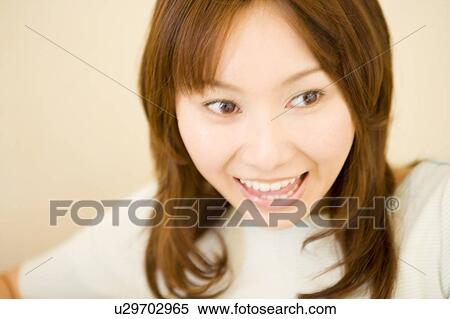Smiling Japanese woman View Large Photo Image Stock Photography - Smiling Japanese woman. Fotosearch