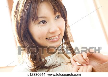 Picture - Smiling woman. Fotosearch
