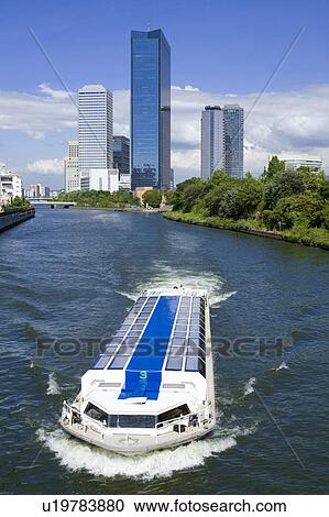Water-bus and Osaka Business Center View Large Photo Image Stock Image - Water-bus and Osaka Business Center. Fotosearch