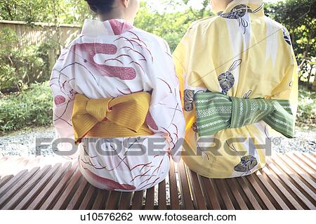 Back figure of women wearing a yukata View Large Photo Image Stock Image - Back figure of women wearing a yukata. Fotosearch