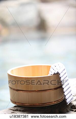 Stock Image - Bath pail and towel. Fotosearch