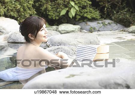 Japanese woman soaking the open-air bath View Large Photo Image Stock Photo - Japanese woman soaking the open-air bath. Fotosearch