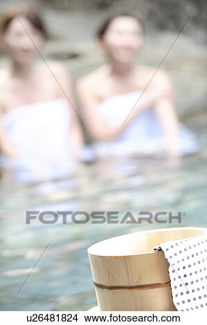 Picture - Japanese women in a open-air bath. Fotosearch