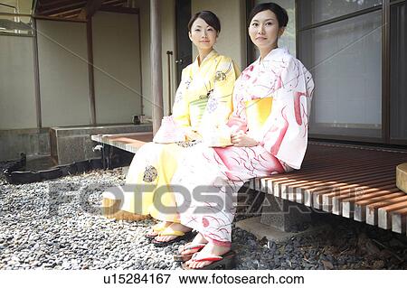 Japanese women sitting on the wooden passageway View Large Photo Image Stock Photo - Japanese women sitting on the wooden passageway. Fotosearch
