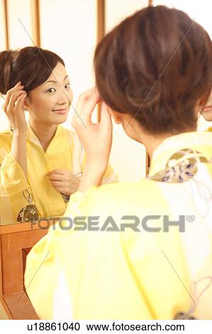 Woman setting hair View Large Photo Image Stock Image - Woman setting hair. Fotosearch