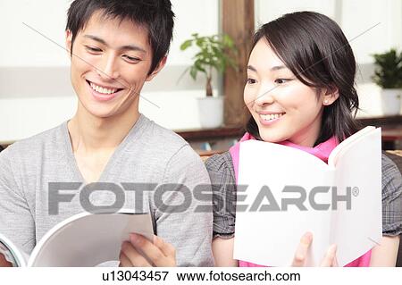 Couple reading books View Large Photo Image Stock Photo - Couple reading books. Fotosearch
