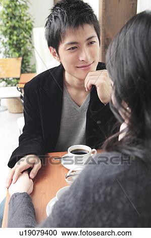 Stock Image - Jpanese couple gazing each other. Fotosearch