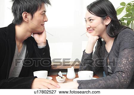 Stock Photo - Jpanese couple gazing each other. Fotosearch
