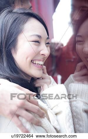 Picture - Laughing young woman. Fotosearch