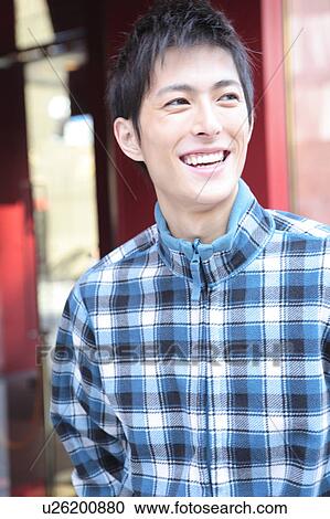 Stock Image - Portrait of Japanese young man. Fotosearch