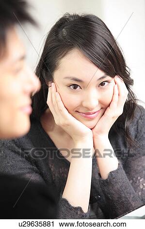 Stock Image - Smiling Japanese woman. Fotosearch