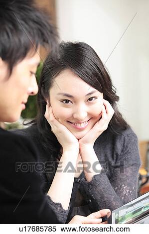 Stock Photography - Smiling Japanese woman. Fotosearch