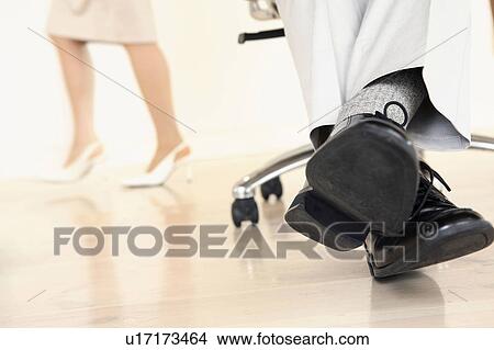 Picture - Foot of Japanese office worker. Fotosearch
