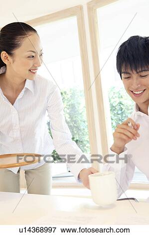 Stock Photo - Office workers taking a rest. Fotosearch