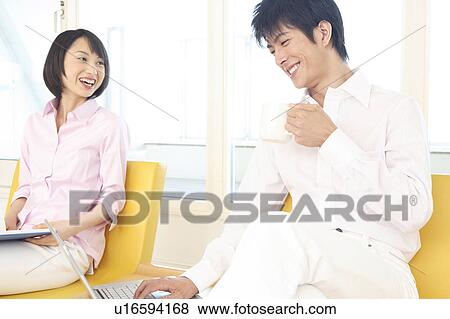 Stock Photo - Office workers taking a rest. Fotosearch