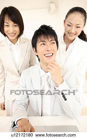 Stock Image - Portrate of Japanese office workers. Fotosearch
