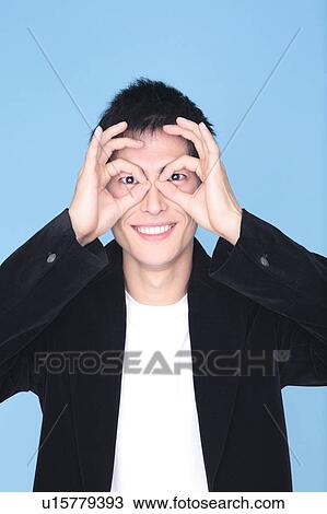 Stock Image - Clowning Japanese man. Fotosearch