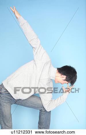 Japanese man posing strange View Large Photo Image Stock Image - Japanese man posing strange. Fotosearch