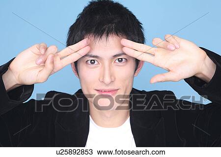 Stock Image - Portrait of Japanese man. Fotosearch