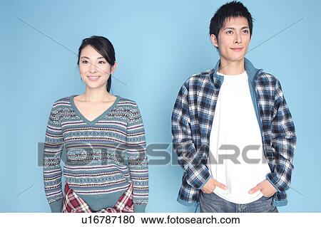 Stock Image - Portrait of Japanese young couple. Fotosearch