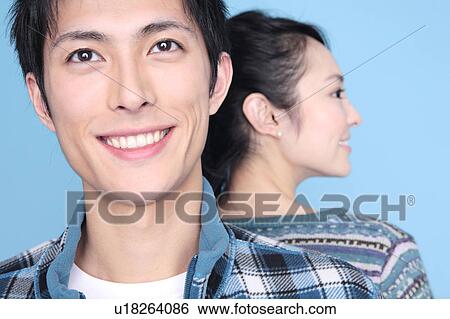 Stock Photograph - Portrait of Japanese young couple. Fotosearch