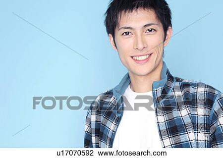 Stock Image - Portrait of Japanese young man. Fotosearch
