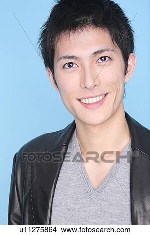 Picture - Portrait of smiling young man. Fotosearch