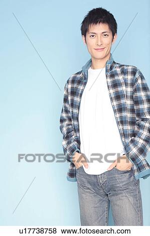 Stock Photo - Portrait of young man. Fotosearch