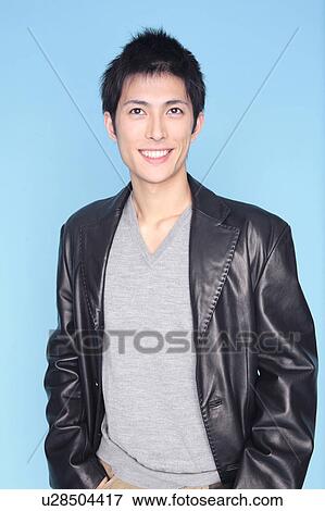 Stock Photo - Portrait of young man. Fotosearch