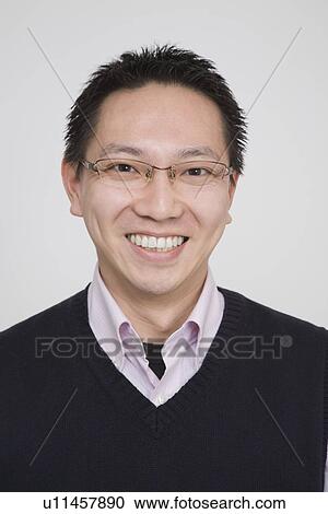 Stock Image - Portrait of a mid adult man. Fotosearch