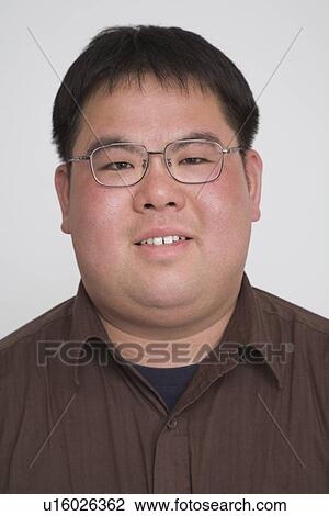 Stock Image - Portrait of a mid adult man. Fotosearch