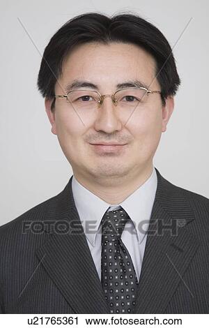 Stock Image - Portrait of a mid adult man. Fotosearch