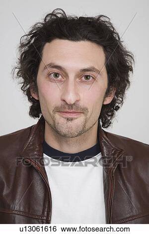 Portrait of a mid adult man View Large Photo Image Stock Photograph - Portrait of a mid adult man. Fotosearch