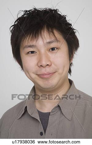 Stock Photograph - Portrait of a mid adult man. Fotosearch