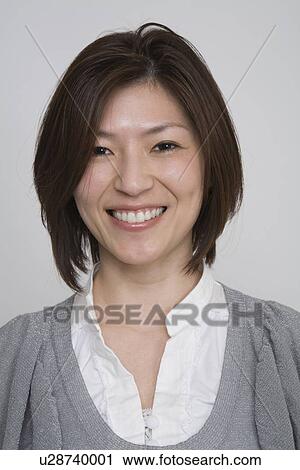 Portrait of a mid adult woman View Large Photo Image Stock Image - Portrait of a mid adult woman. Fotosearch