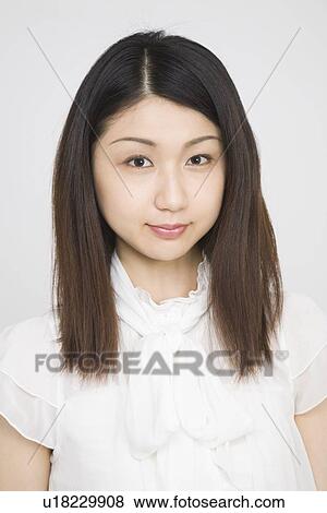 Stock Photo - Portrait of a mid adult woman. Fotosearch
