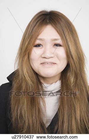 Stock Photo - Portrait of a mid adult woman. Fotosearch