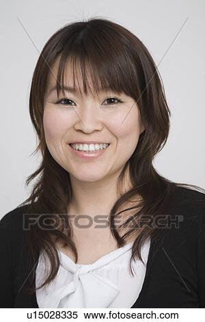 Stock Photography - Portrait of a mid adult woman. Fotosearch