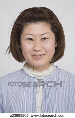 Stock Photography - Portrait of a mid adult woman. Fotosearch