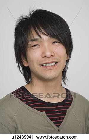 Stock Image - Portrait of a young man. Fotosearch
