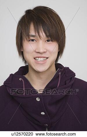Stock Image - Portrait of a young man. Fotosearch